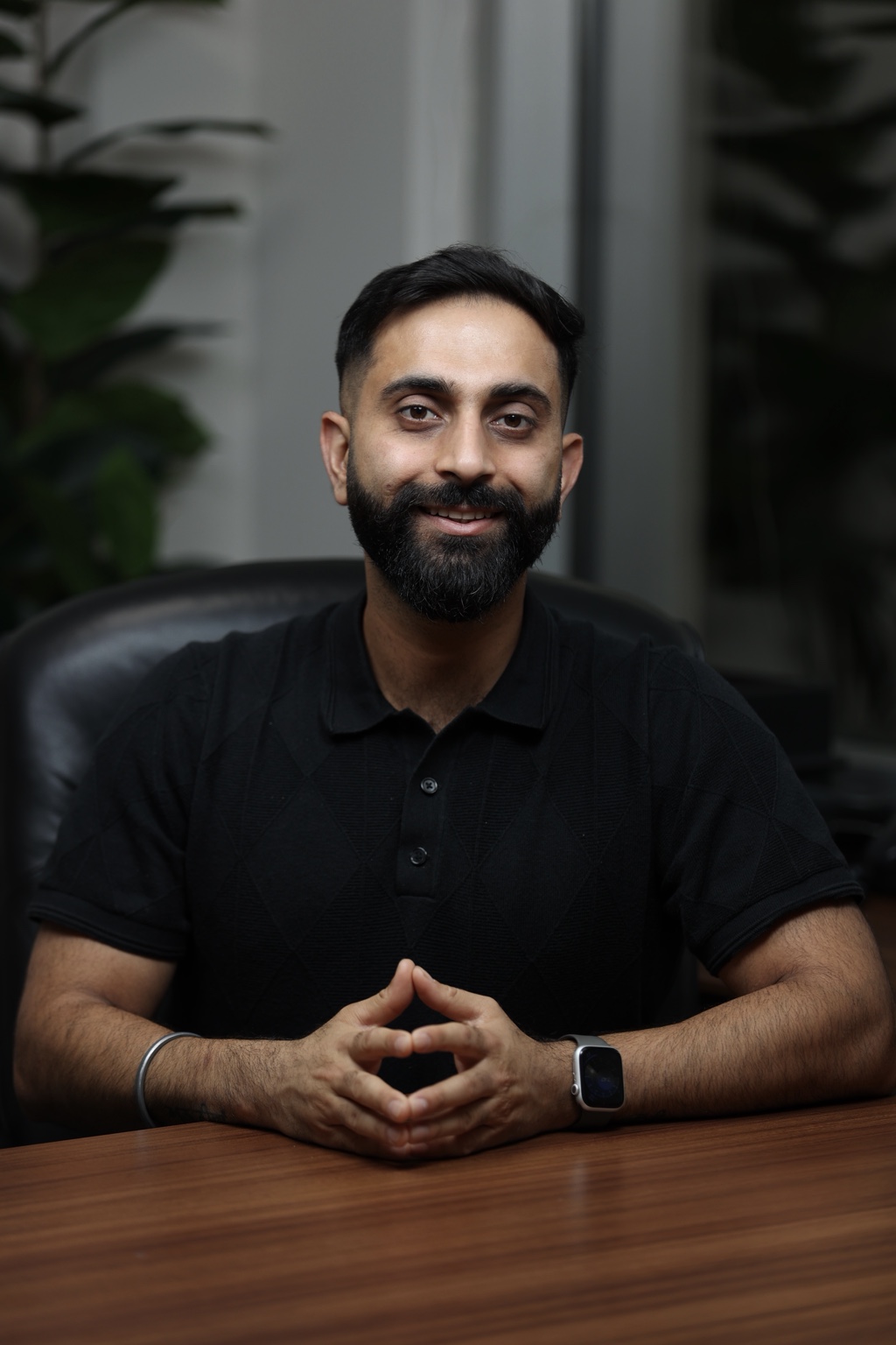 Aashish Singh seated in a professional setting